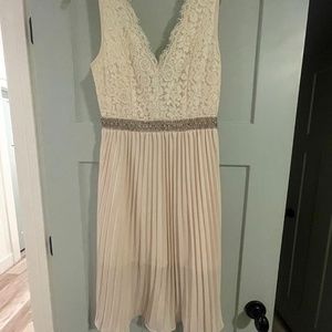 Cute lace dress with pleated skirt